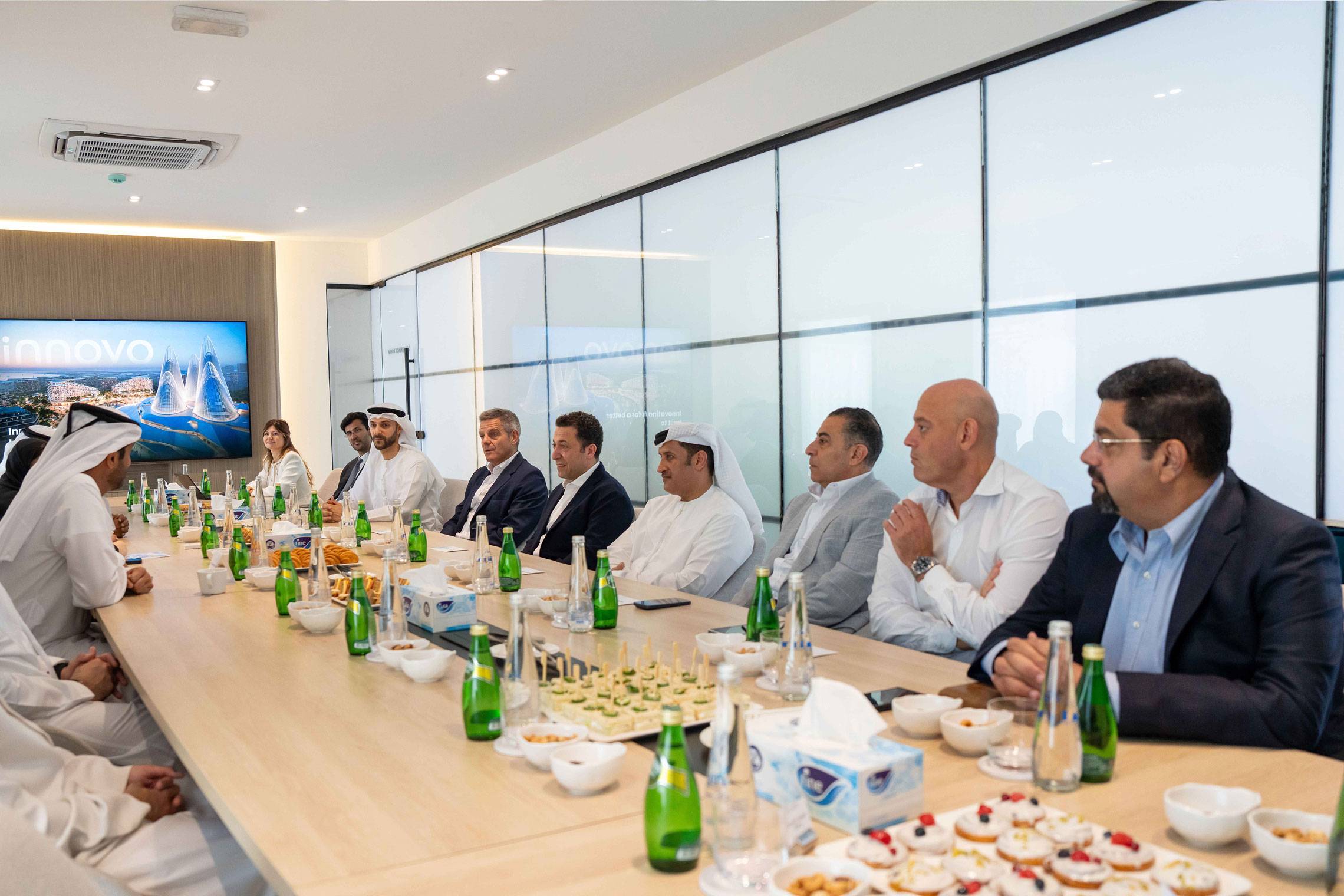 H.E. Abdulla bin Touq in a briefing with Innovo leadership on construction technology