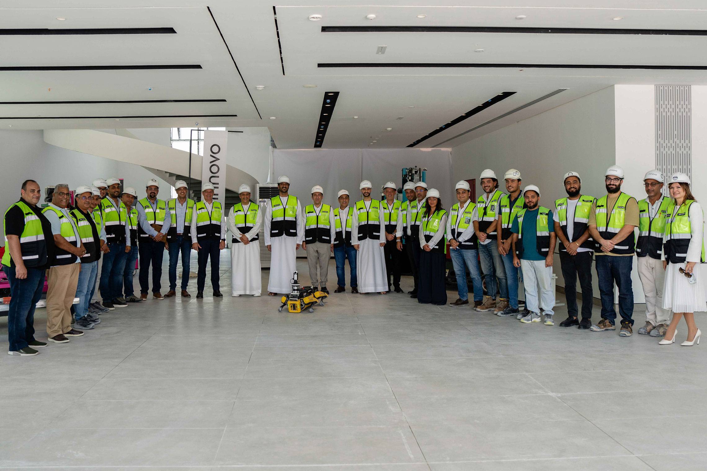 UAE government delegation with Innovo engineers and site workers in PPE, Dubai