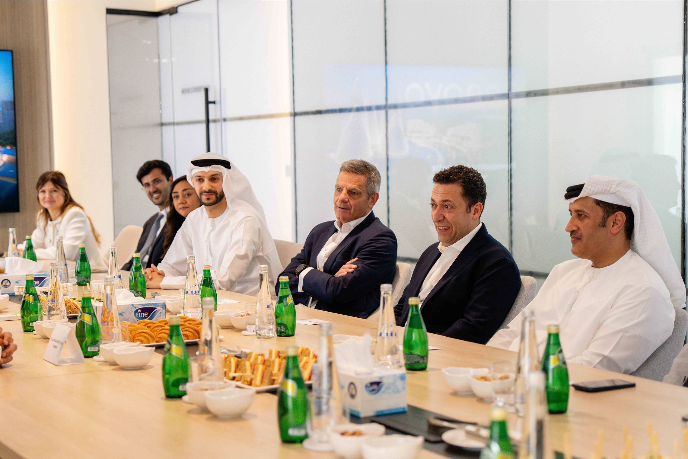 H.E. Abdulla bin Touq meets Innovo Group executives at the boardroom table