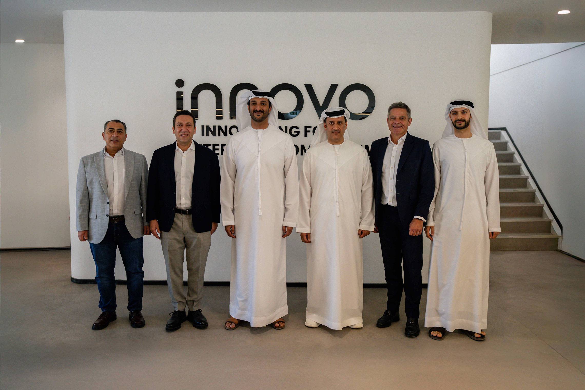 H.E. Abdulla bin Touq Al Marri with Innovo Group leaders at Innovo's Dubai office