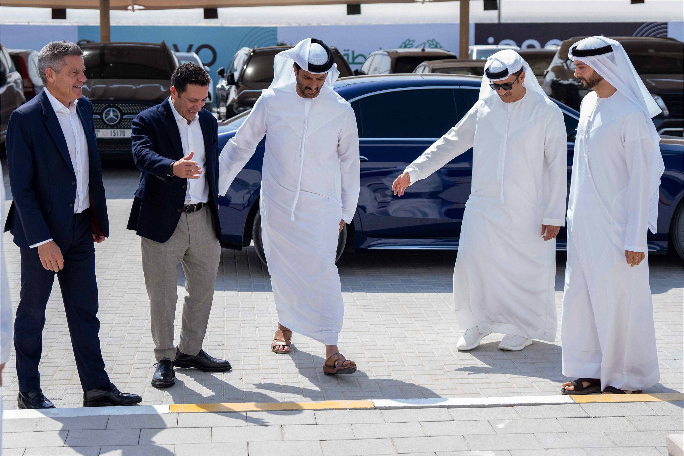 Innovo executives welcome H.E. Abdulla bin Touq Al Marri on arrival at a Dubai project site