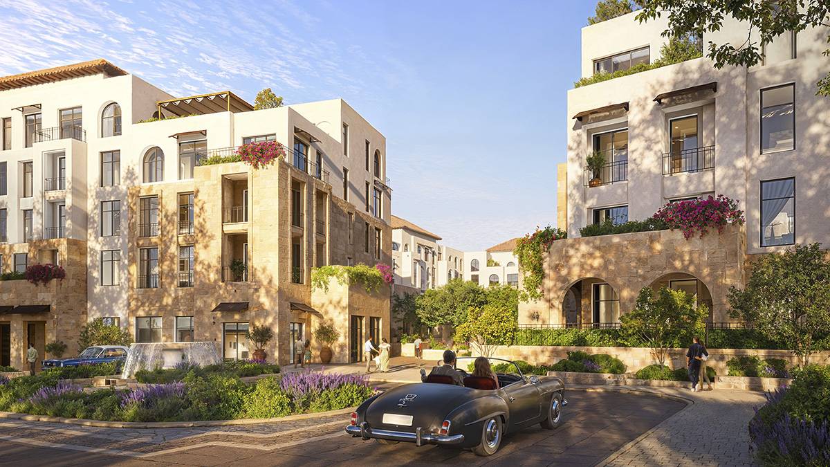 Rendering of stone and white residential buildings around a landscaped courtyard at Wadi Yemm, Ras El Hekma